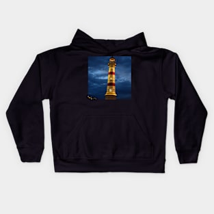 colorfull lighthouse at night in Malmö Sweden Kids Hoodie